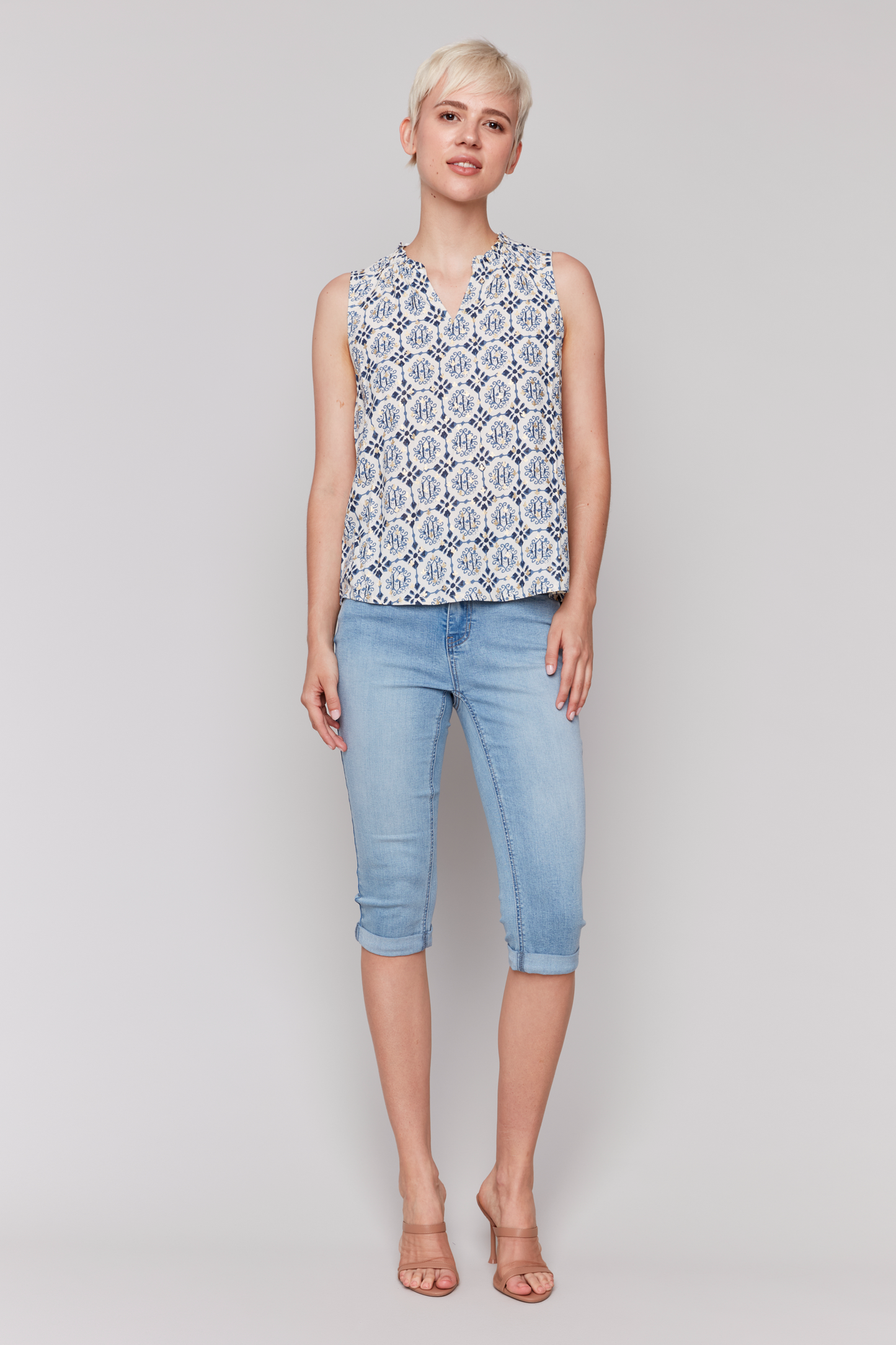 Printed Sleeveless Blouse with Ruffle Collar