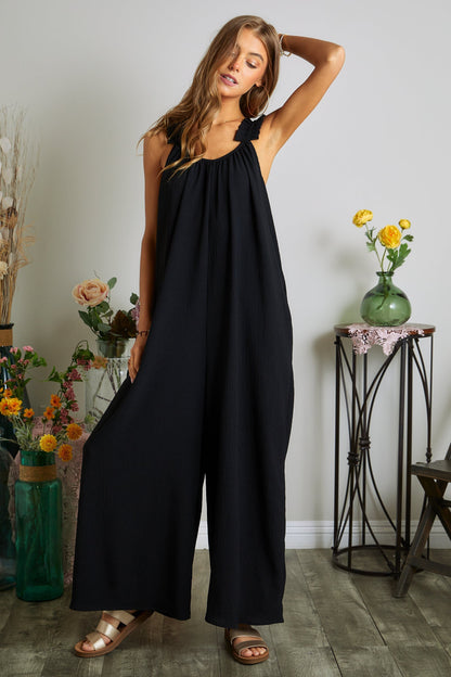 ELASTIC RUFFLE SHOULDER JUMPSUIT