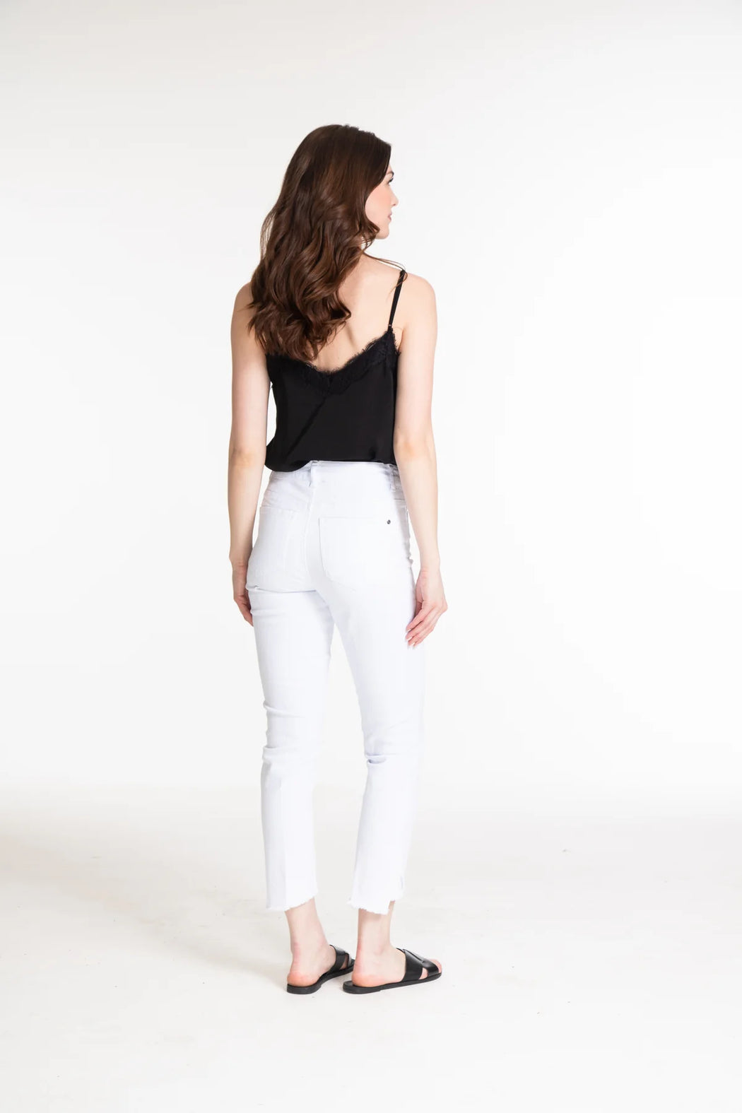 CONTOUR WAIST ASYMMETRICAL FRINGE HEM ANKLE JEAN - medium indigo only