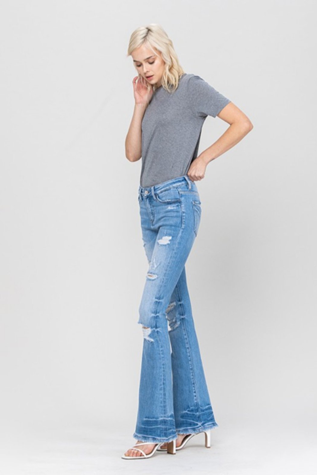 Distressed Mid Rise Flare Jeans