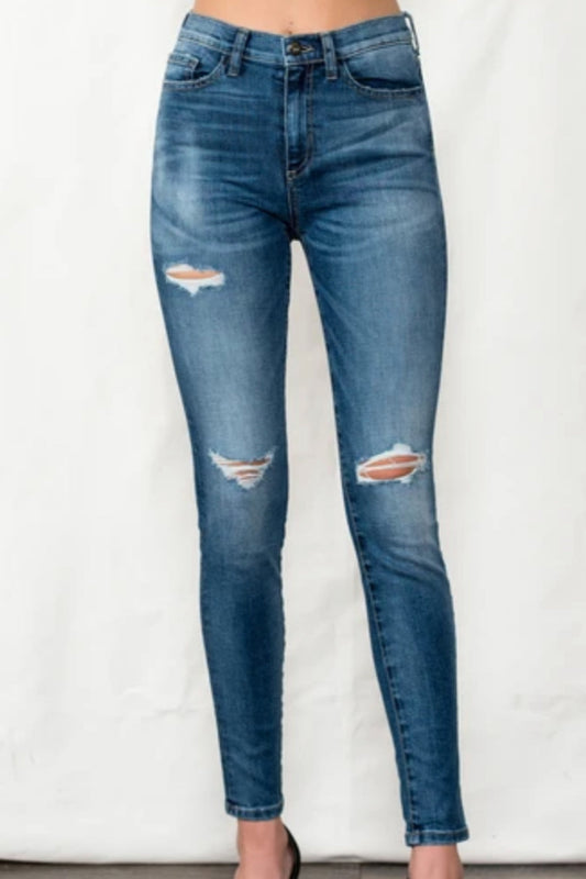 Mid Rise Skinny Jean With Distressing