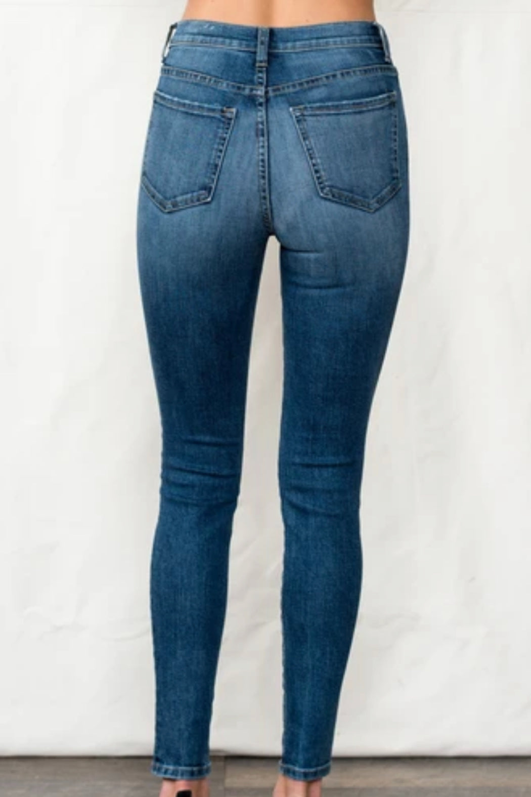 Mid Rise Skinny Jean With Distressing