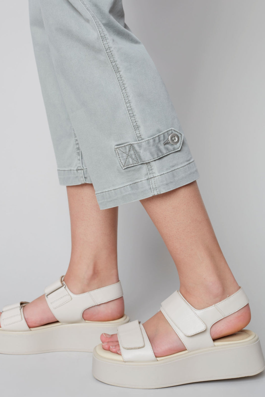 Pull on denim pant with side button detail