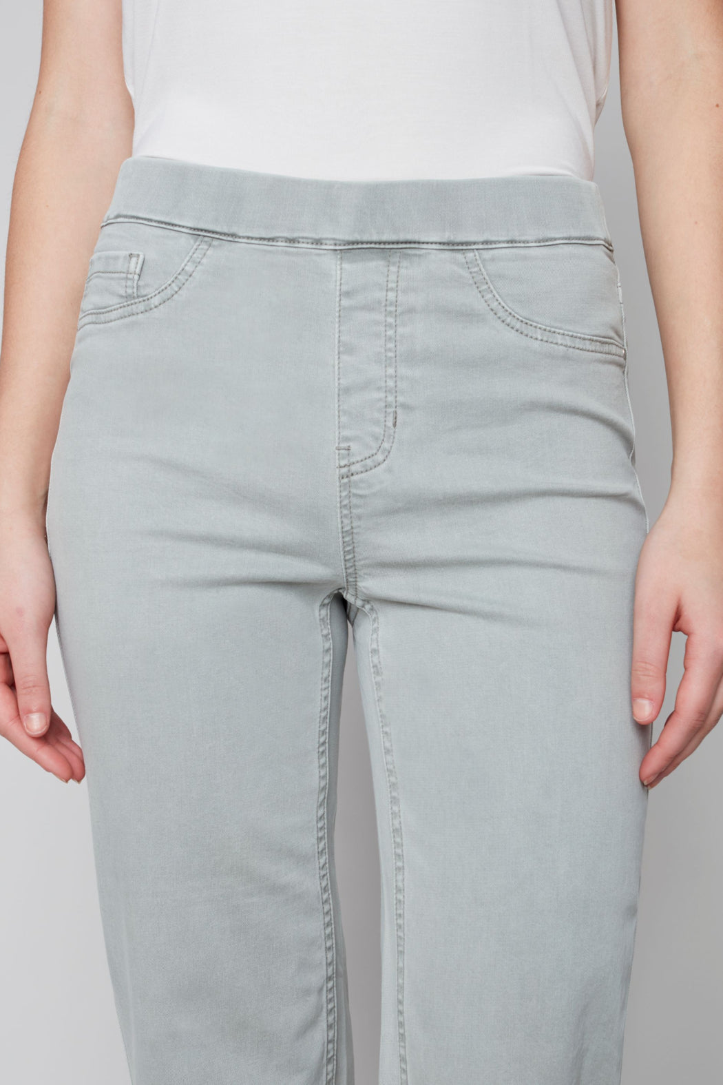 Pull on denim pant with side button detail
