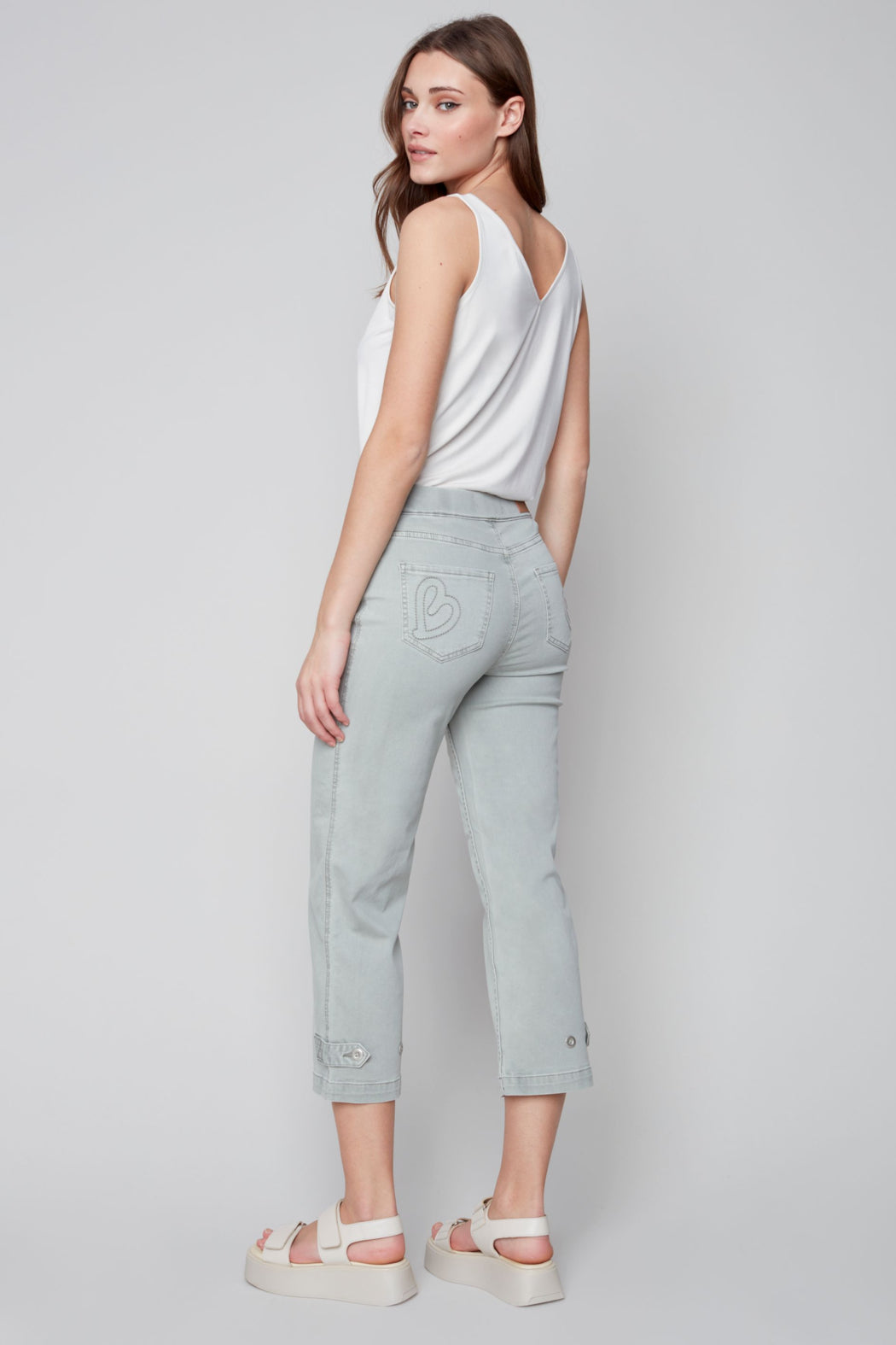 Pull on denim pant with side button detail