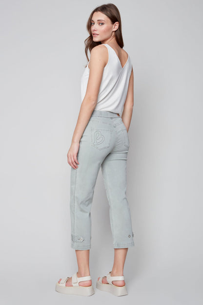 Pull on denim pant with side button detail