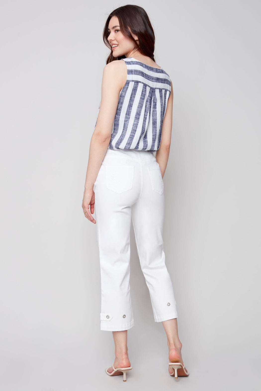 Pull on denim pant with side button detail