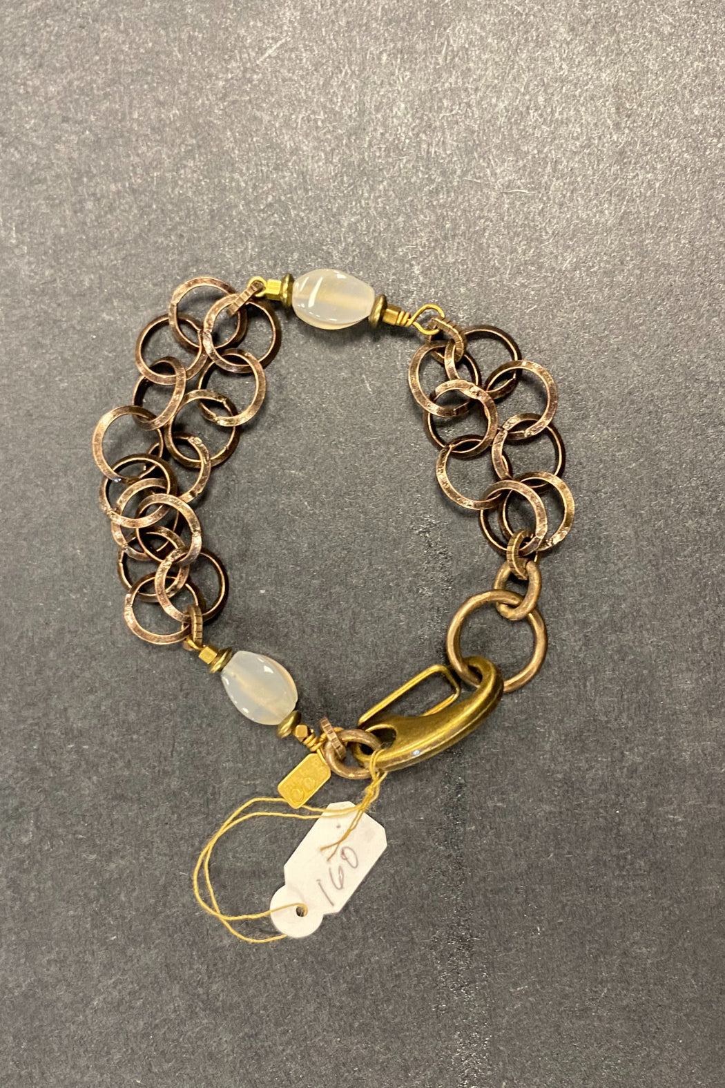 Rutilated quartz on brass circles